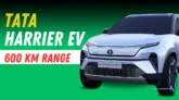 Tata Harrier EV 2025 front view in electric blue color with LED DRLs and illuminated Tata logo on highway background.