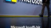 Microsoft headquarters with a cloudy sky above, symbolizing uncertainty after recent layoffs in 2025.